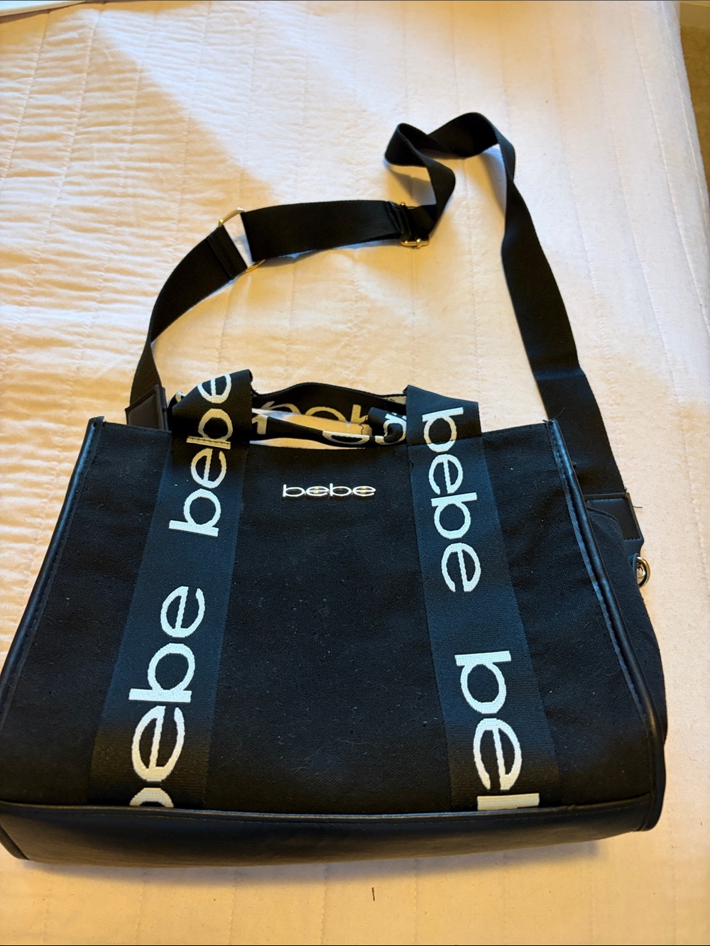 bebe Black Canvas Logo Strap Messenger Bag with White Logo